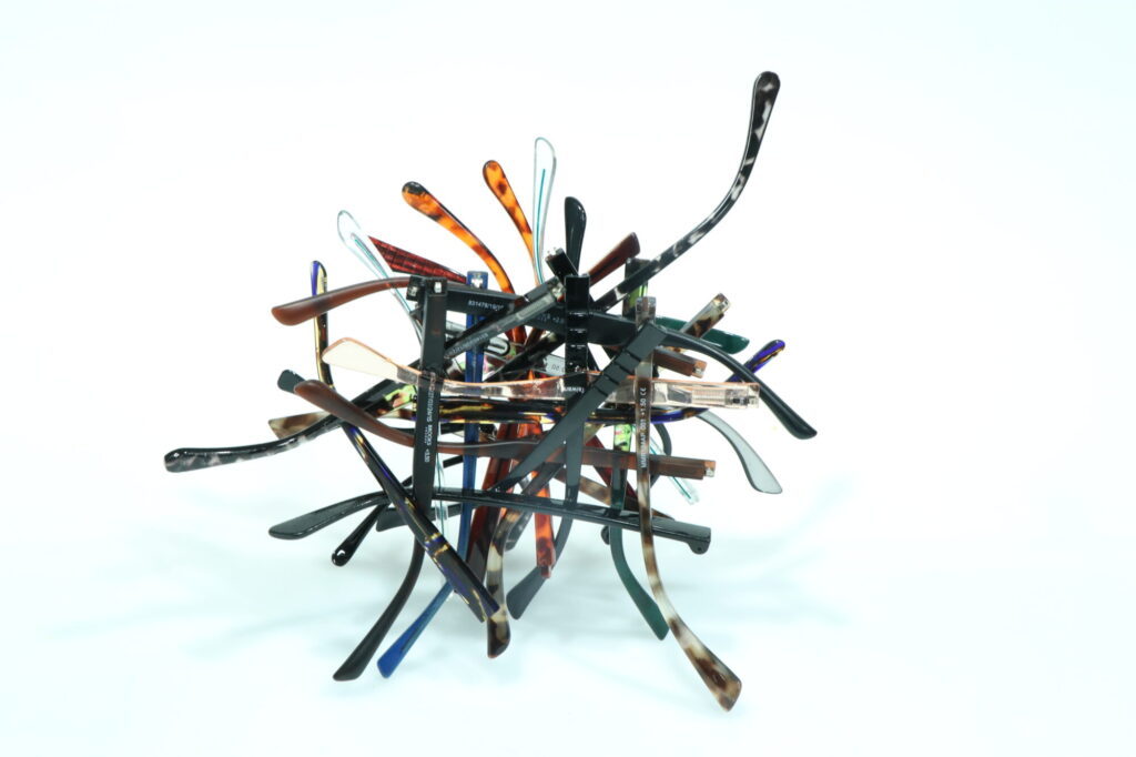sculpture made of eyeglasses frame temples by Mohan venkadesan